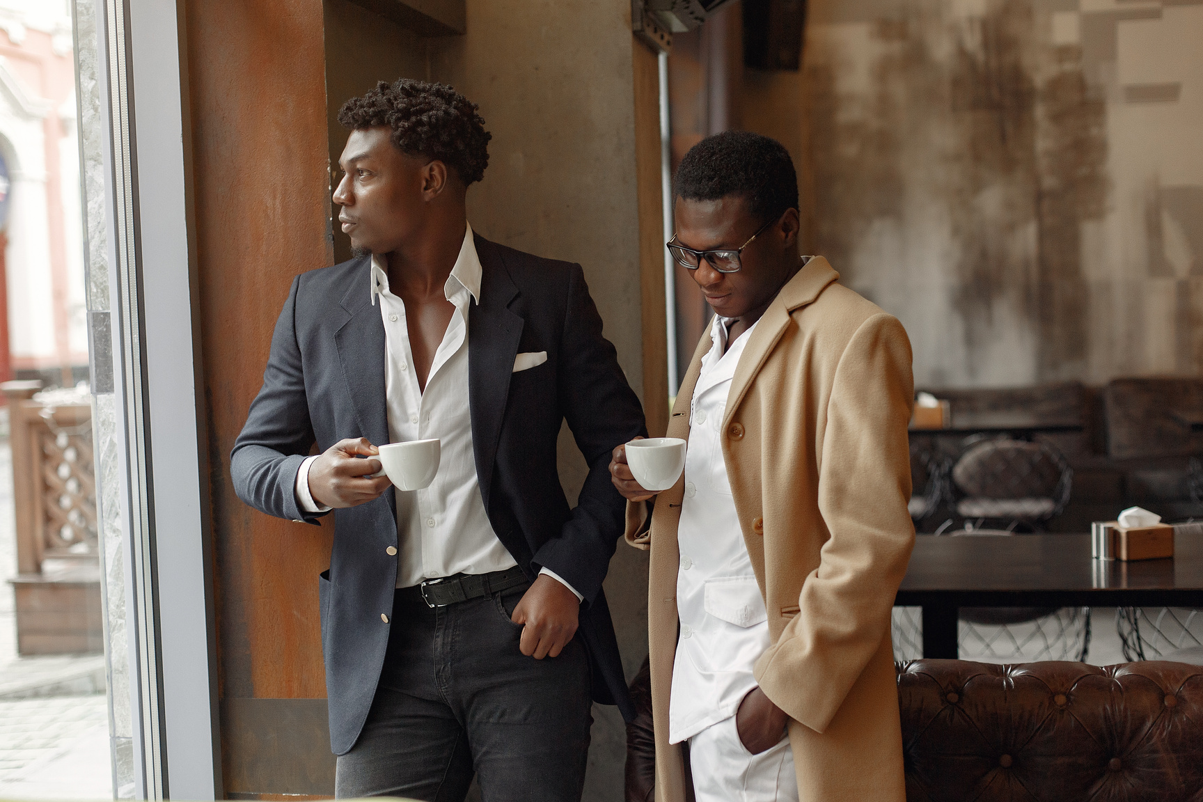 Black Men in a Cafe Have a Business